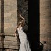 REMI_EY335 DEEP PLUNGE NECK WITH SPAGHETTI STRAPS FULL CHANTILLY LACE FIT AND FLARE WEDDING DRESS WITH DEEP V BACK EVIE YOUNG BRIDAL 1