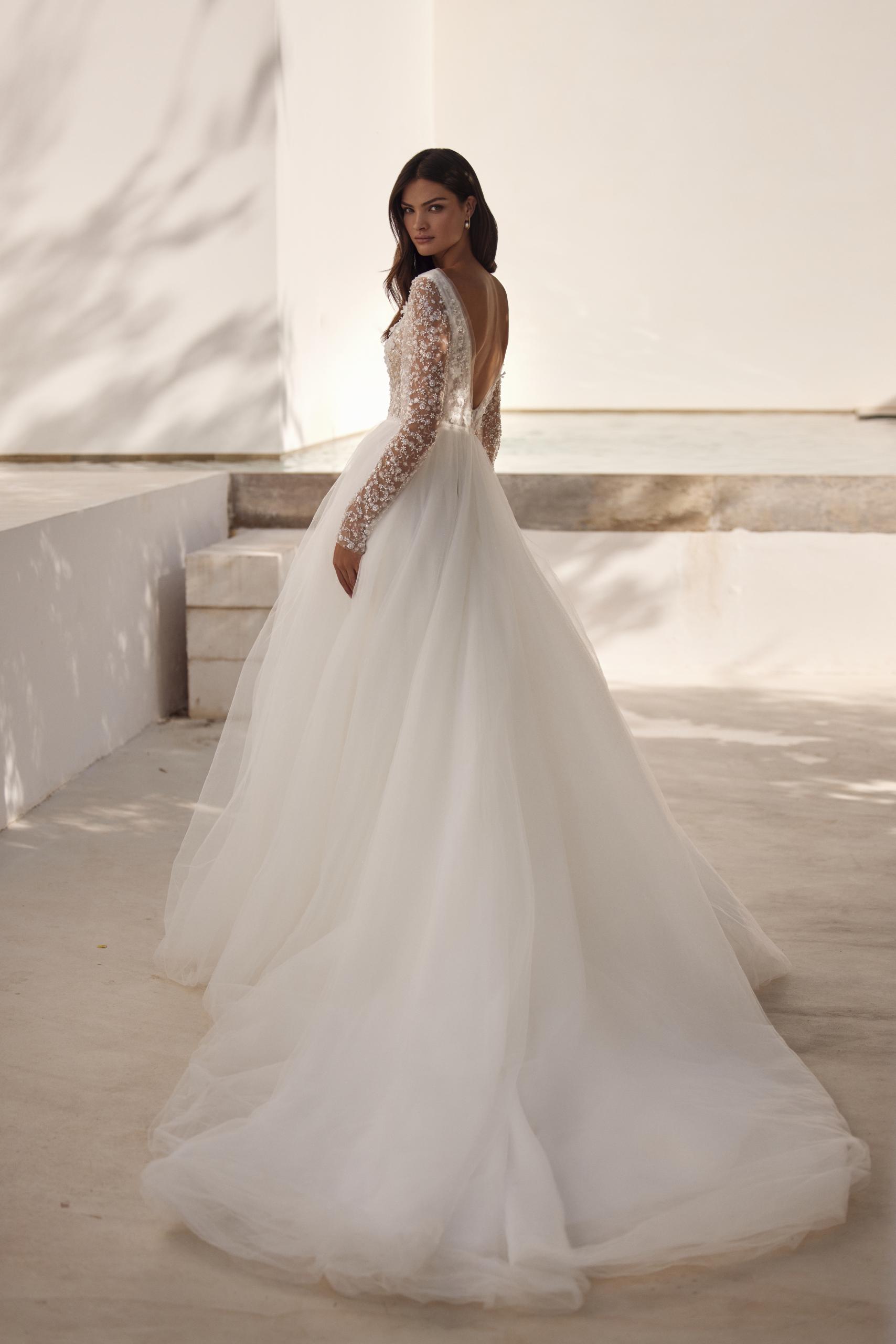 Fantasy Floral Lace Applique Plunging V Neckline Long Sleeves A-Line Wedding Gown